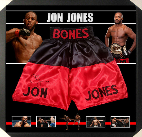 Jon JONES UFC WORLD CHAMPION Signed & Framed Trunks (PSA DNA).